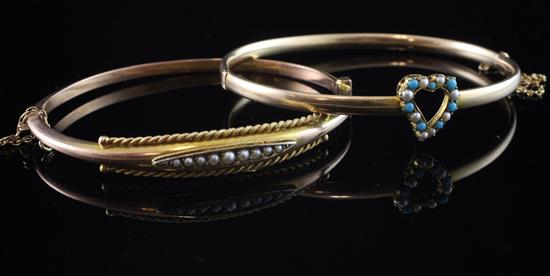 Two Edwardian hinged bracelets.